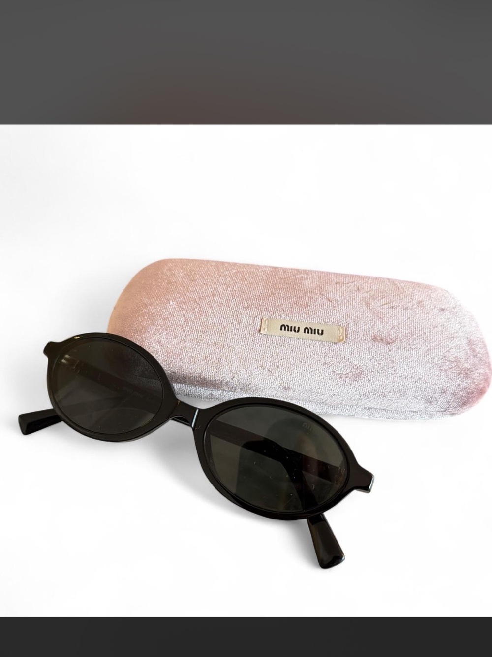 Miu Miu Black Oval Sunglasses MU 04ZS